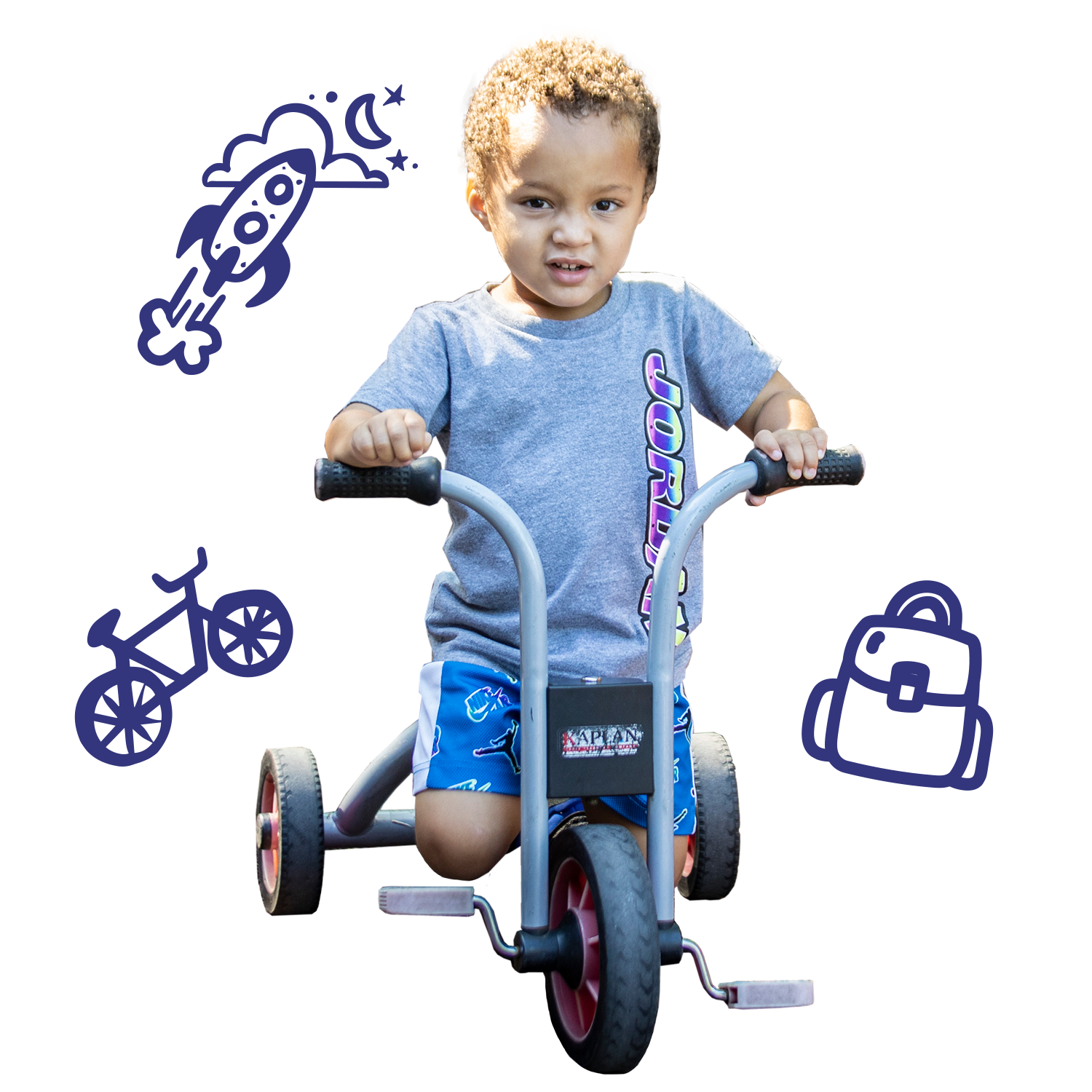 boy riding a tricycle